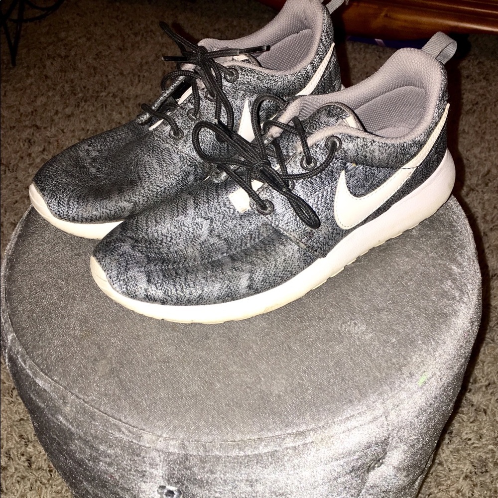 Grey and Black patterned Nike Roshes